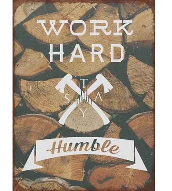 Tekstbord: "Work hard stay humble"