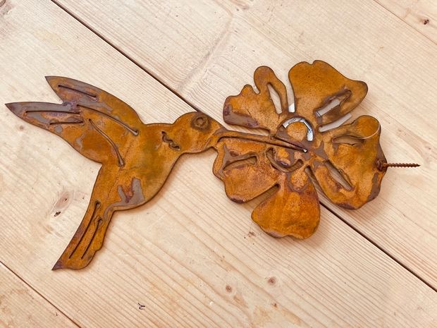 Schroefkolibrie met Bloem