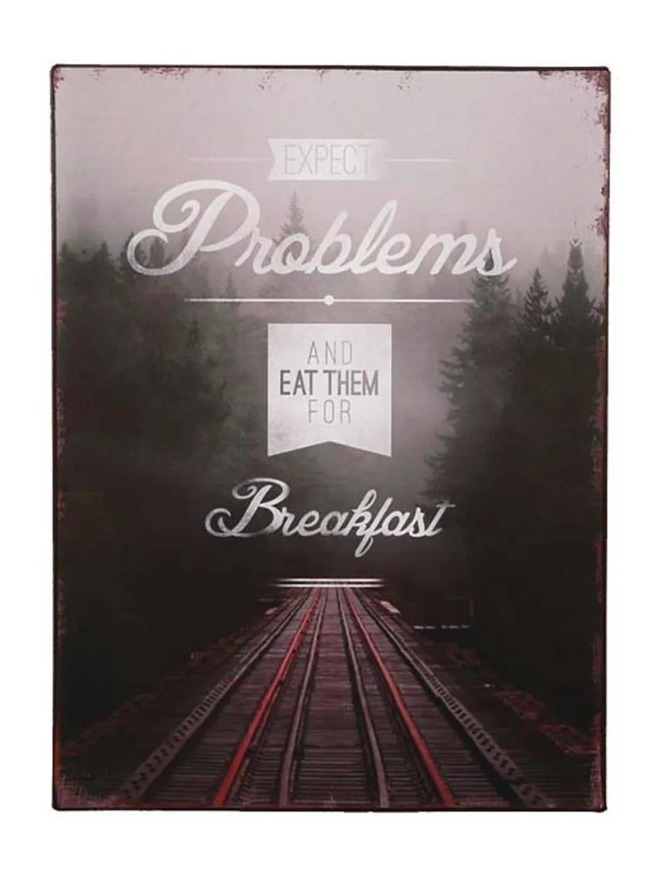 Tekstbord: "Expect problems and eat them for breakfast"