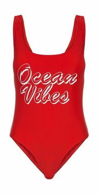 Red swimsuit ocean vibes