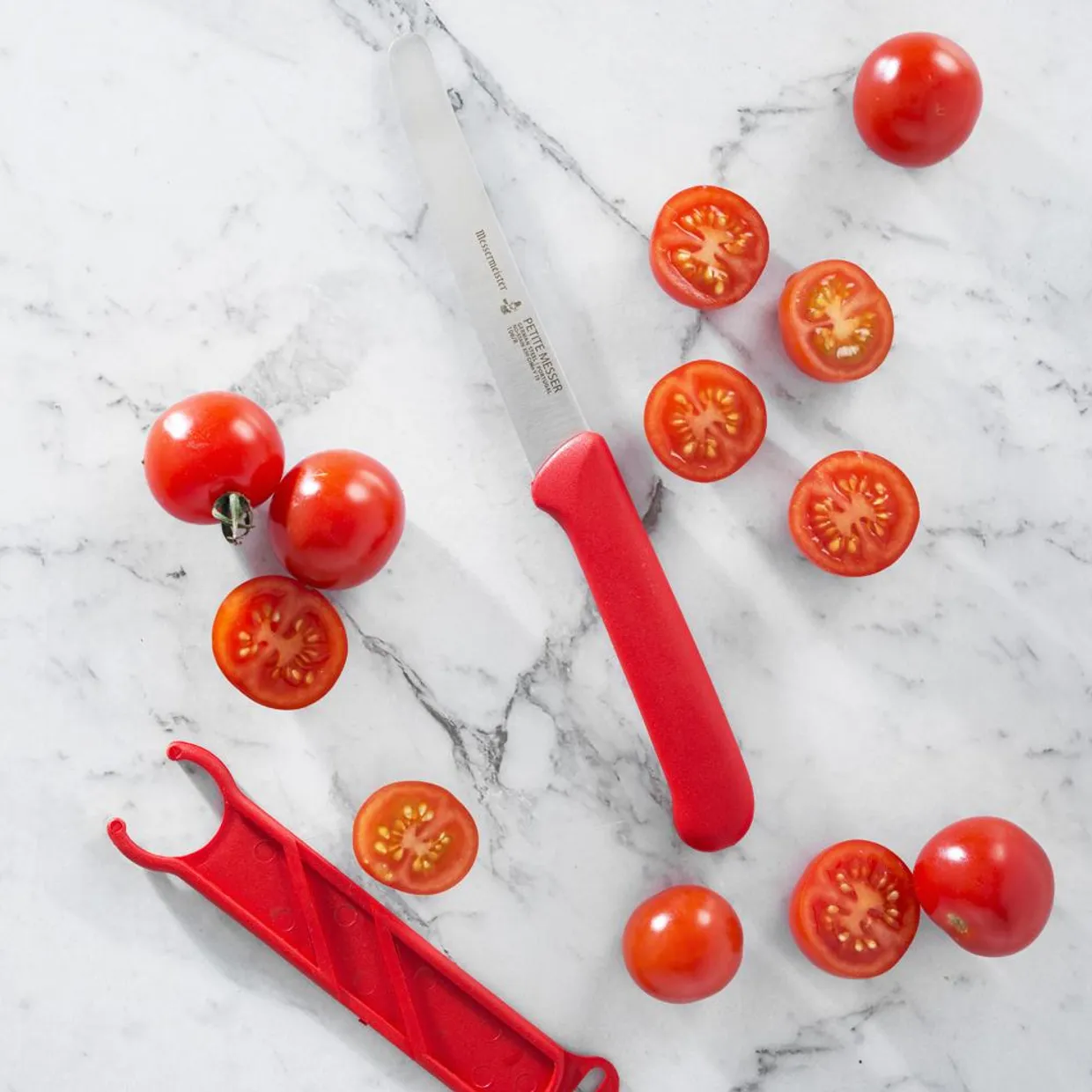 Tomatenmes met beschermhoes - rood